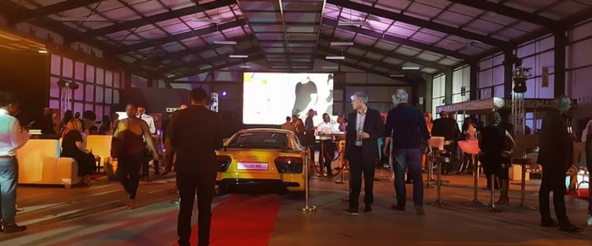 Luxury brand activation — Audi R8 on red carpet at premium product launch